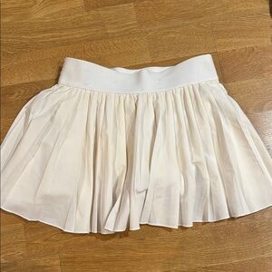 Aritzia Cream Skater Mini Skirt with Pleats